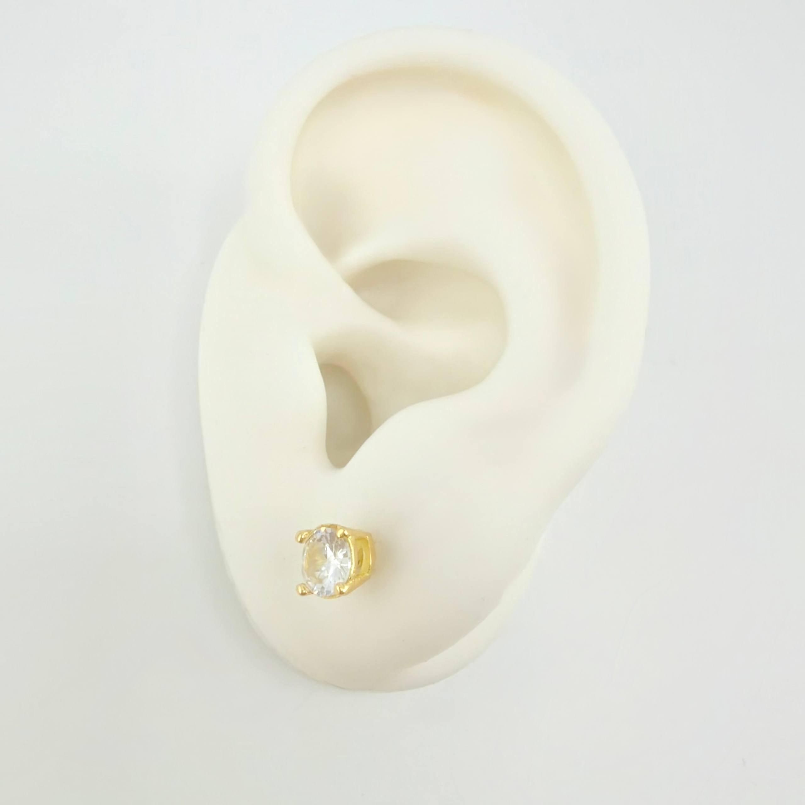 Topos Cuatro Garras 1.4 g / 5.3 mm Oro Amarillo 18K