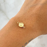 Herraje Letra M 0.45gr / 1.5cm / Circulo Bordeado Oro Amarillo 18K