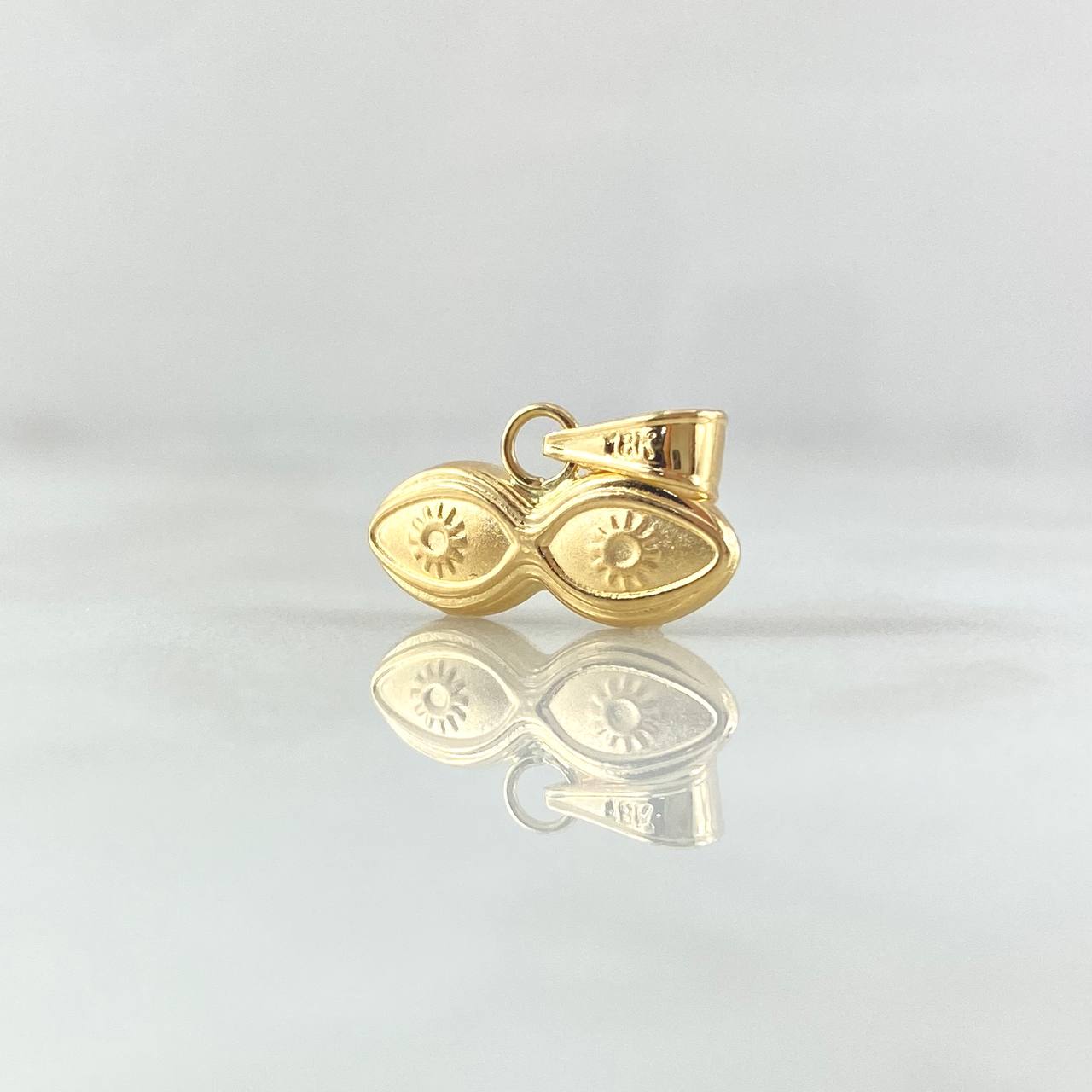 Dije Ojos De Santa Lucia 0.6gr / 1.5cm / Oro Amarillo 18K ©