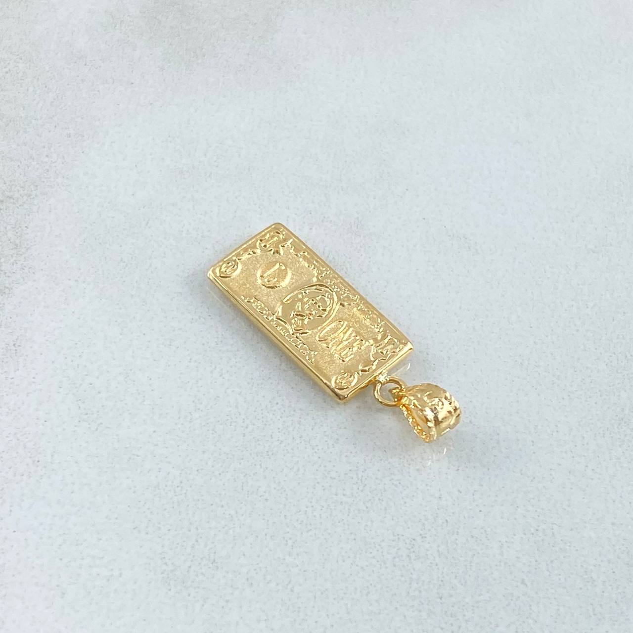 Dije Dólar 0.6gr / 2cm / Oro Amarillo 18K ©