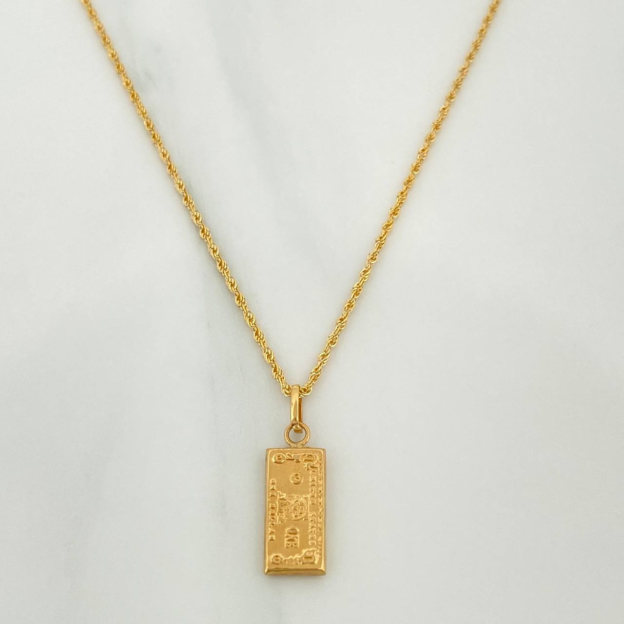 Set Cadena Lazo + Dije One Dólar / 1.75gr / 60 cm Oro Amarillo 18K