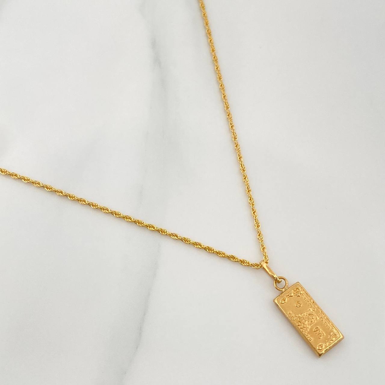 Set Cadena Lazo + Dije One Dólar / 1.75gr / 60 cm Oro Amarillo 18K