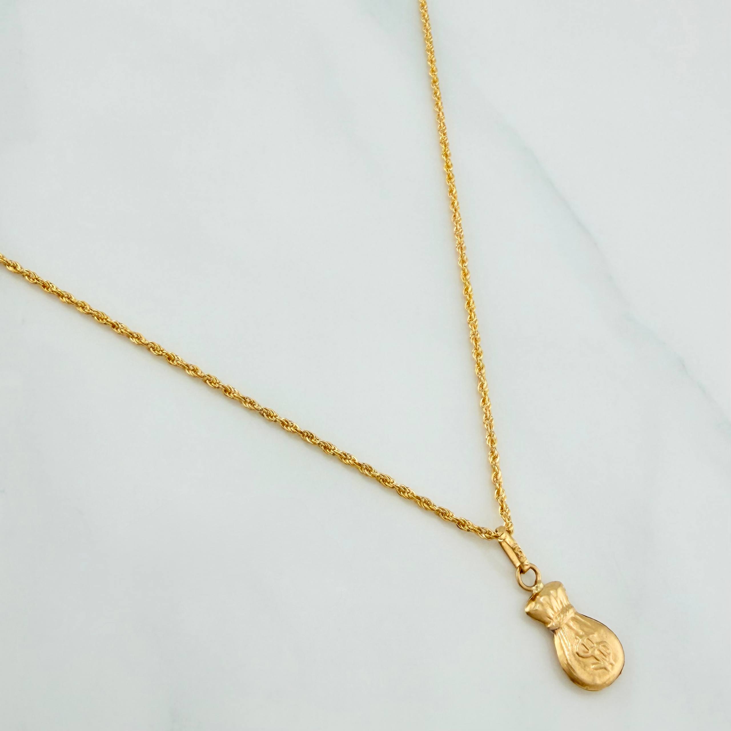 Set Cadena Lazo + Dije Bolsa De Dinero / 1.55gr / 60 cm Oro Amarillo 18K