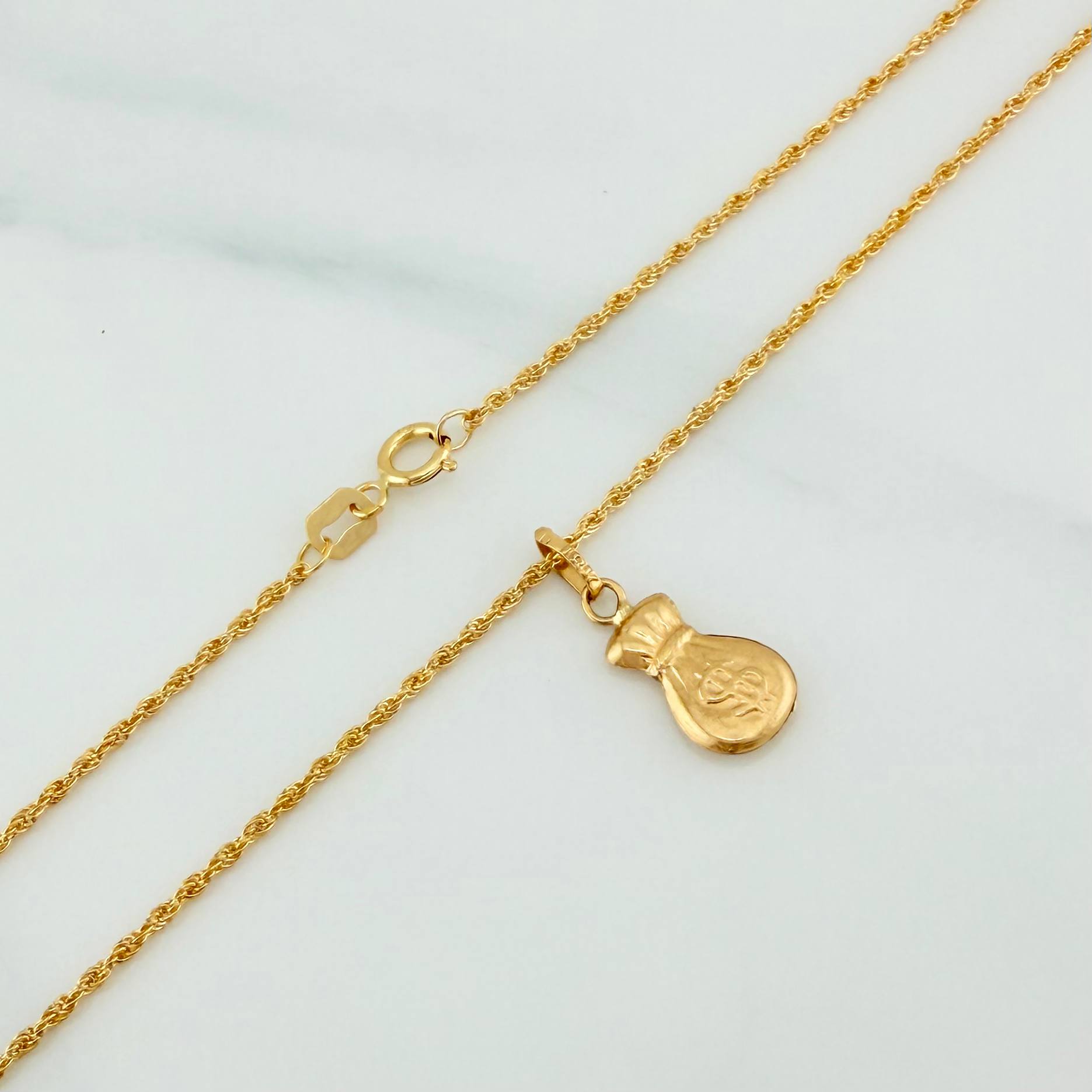 Set Cadena Lazo + Dije Bolsa De Dinero / 1.55gr / 60 cm Oro Amarillo 18K