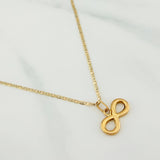 Set Cadena Escalera Plana + Dije Infinito / 2.15gr / 50 cm Tres Oros 18K