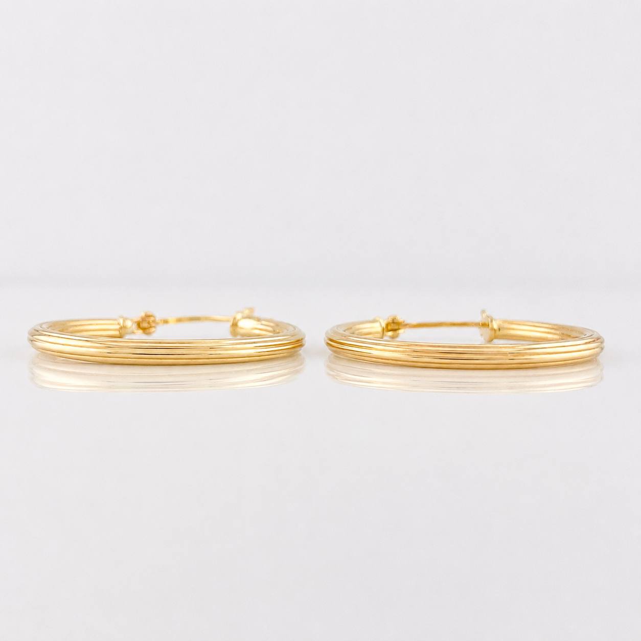 Candongas Espiral 1.5g / 2.7cm Oro Amarillo 18K