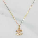 Set Cadena Flor Espejo + Dije Ola Cruzada / 1.3gr / 45 cm Tres Oros 18K