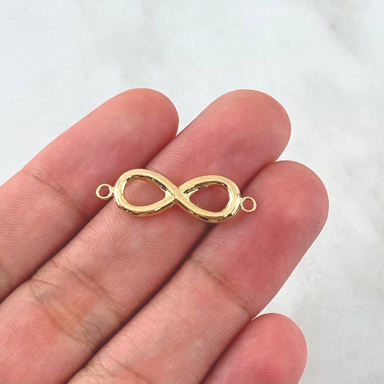 Herraje Infinito Silueta 0.7gr / 2.6cm / Liso Oro Amarillo 18K