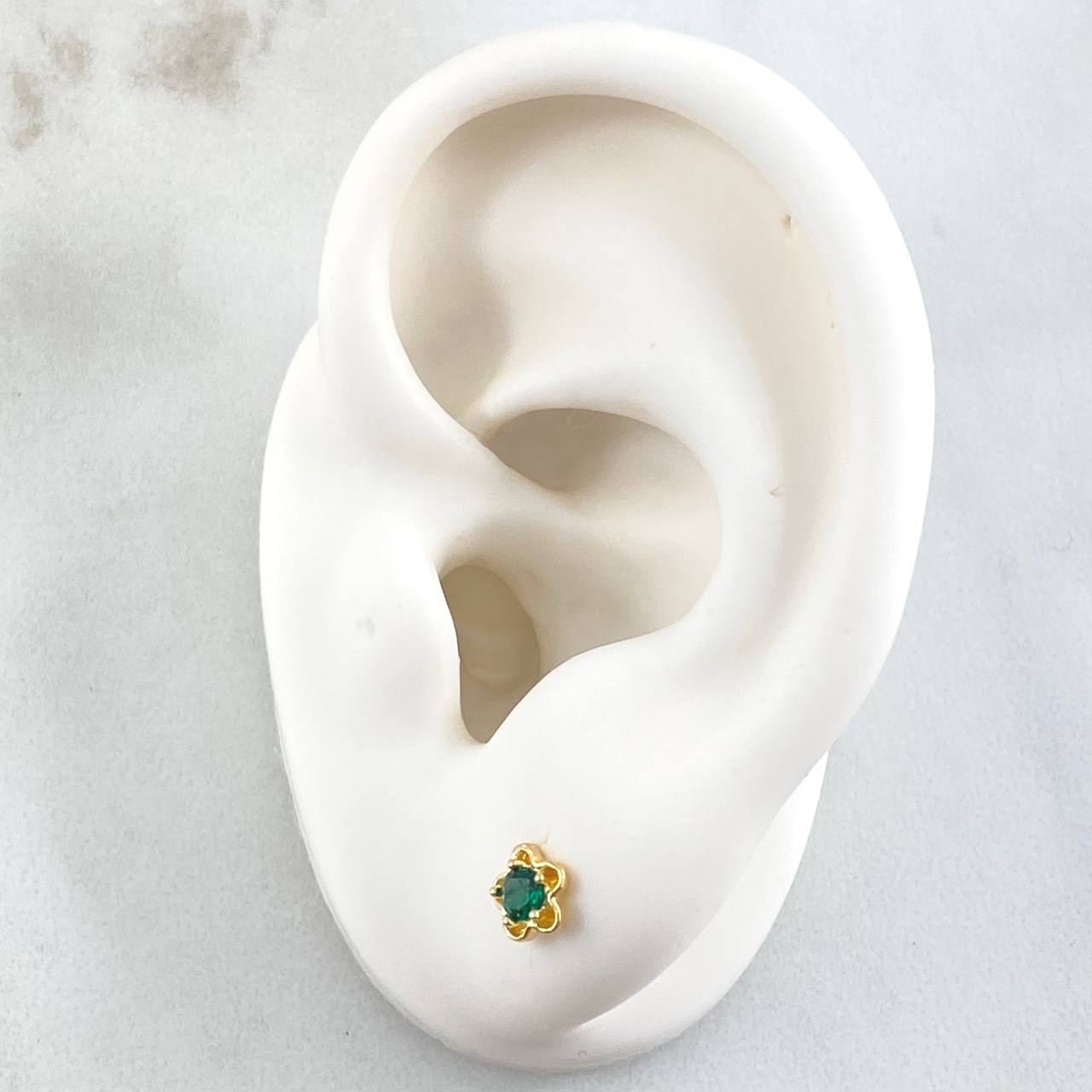 Topos Flor 0.9gr / Oro 18K ©