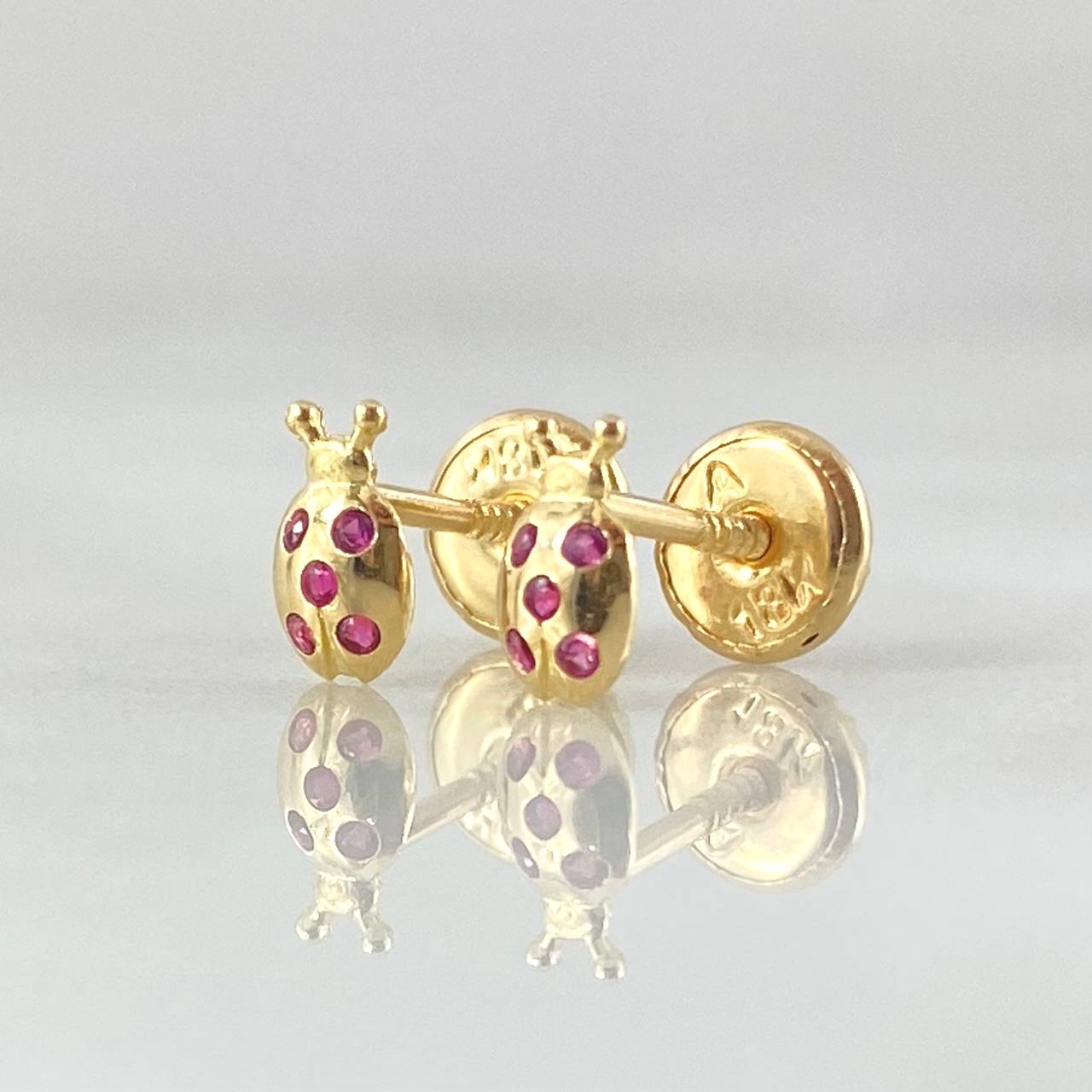 Topos Mariquita 0.65gr / Oro Amarillo 18K