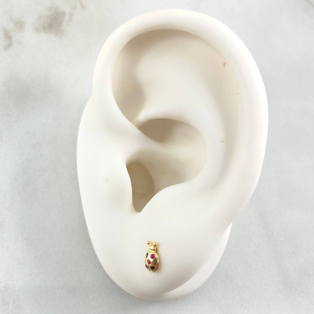 Topos Mariquita 0.65gr / Oro Amarillo 18K