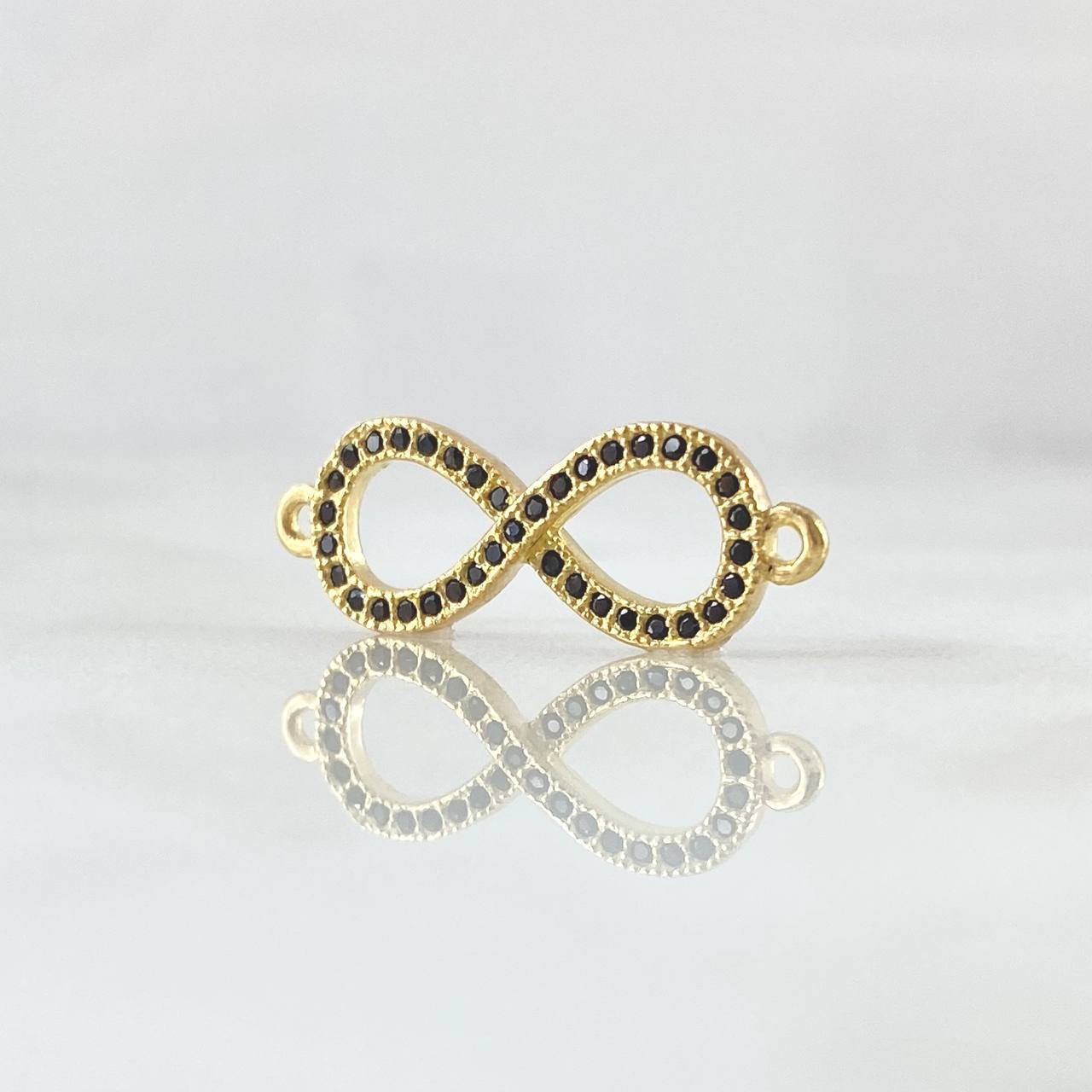 Herraje Infinito 1.2gr / 2.3cm / Circones Negros Oro Amarillo 18K