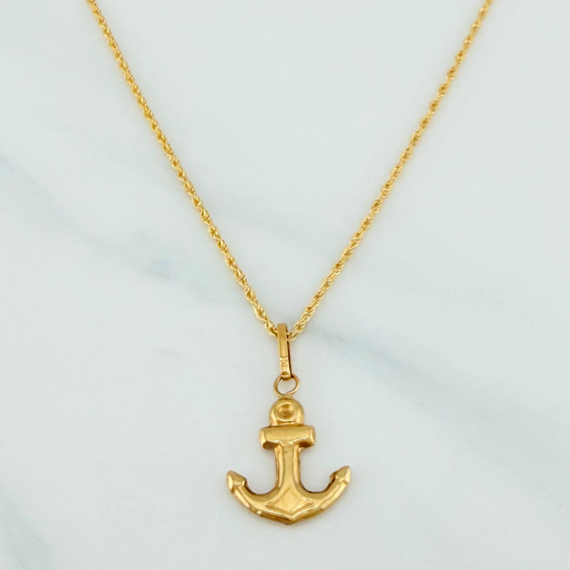 Set Cadena Lazo + Dije Ancla / 1.85gr / 60 cm Oro Amarillo 18K