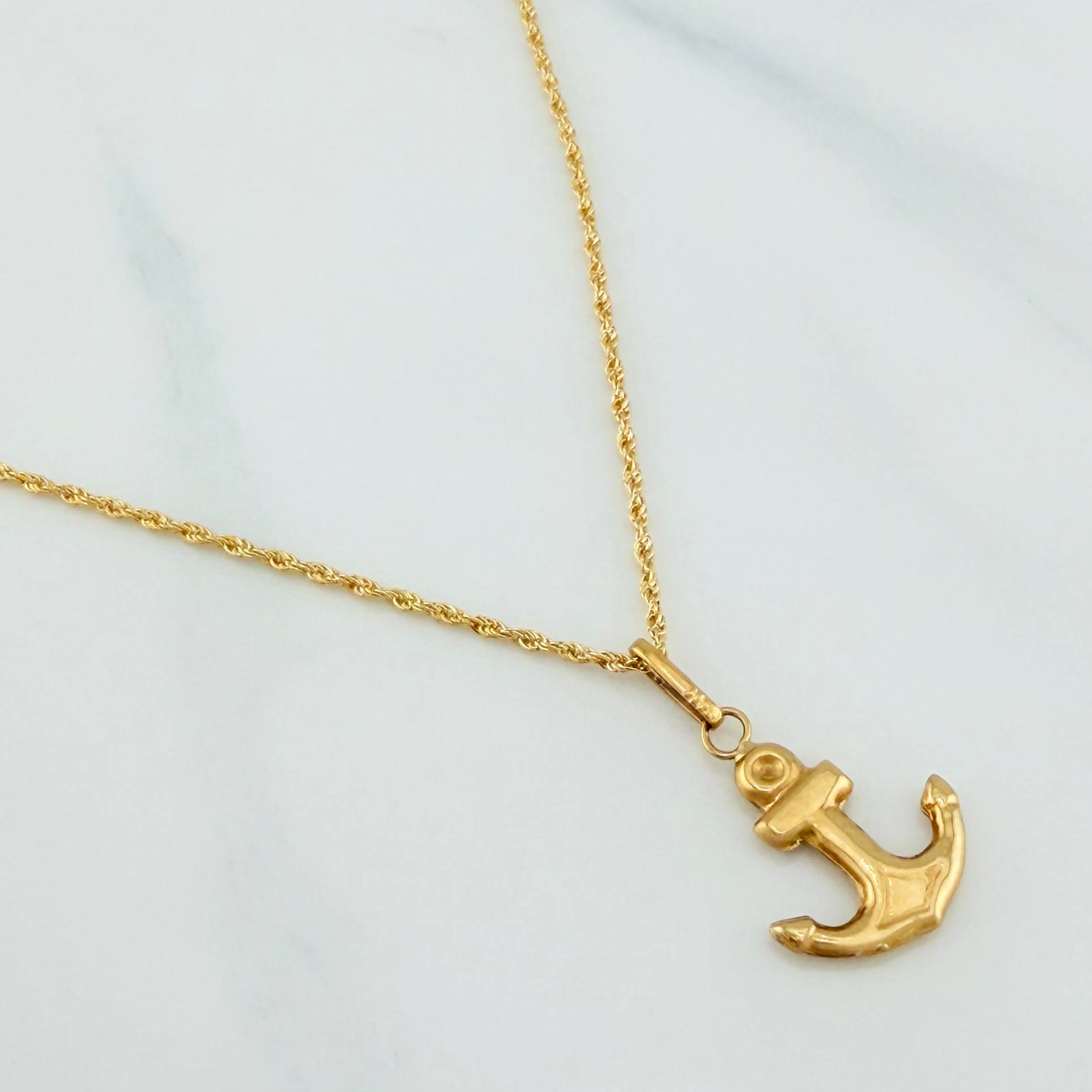 Set Cadena Lazo + Dije Ancla / 1.85gr / 60 cm Oro Amarillo 18K