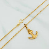 Set Cadena Lazo + Dije Ancla / 1.85gr / 60 cm Oro Amarillo 18K