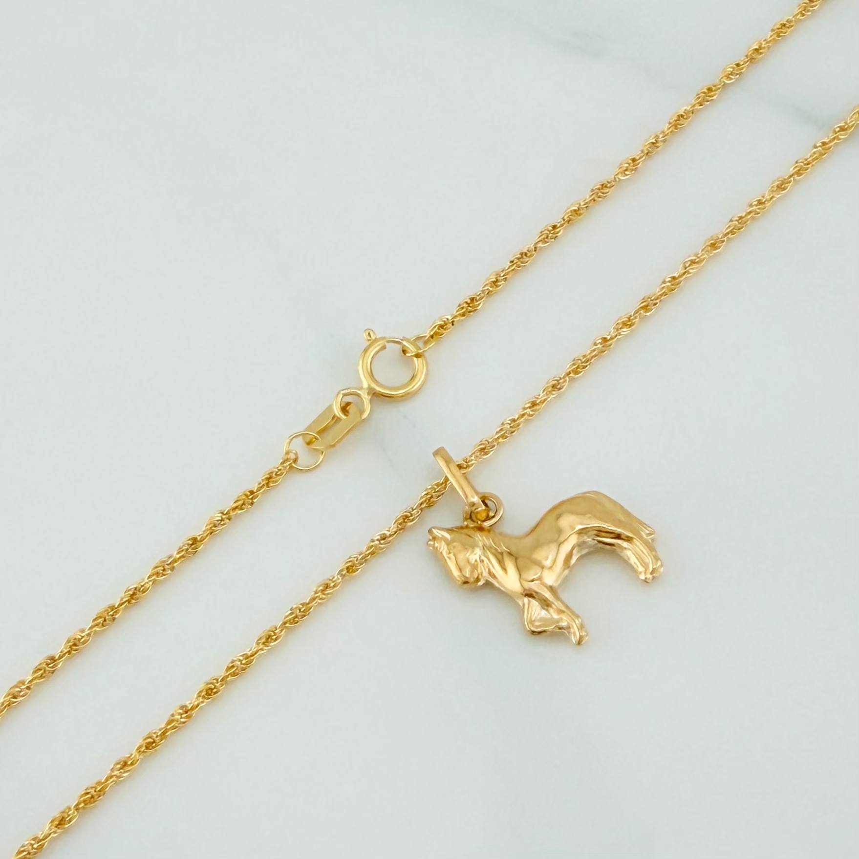 Set Cadena Lazo + Dije Caballo / 1.7gr / 60 cm Oro Amarillo 18K