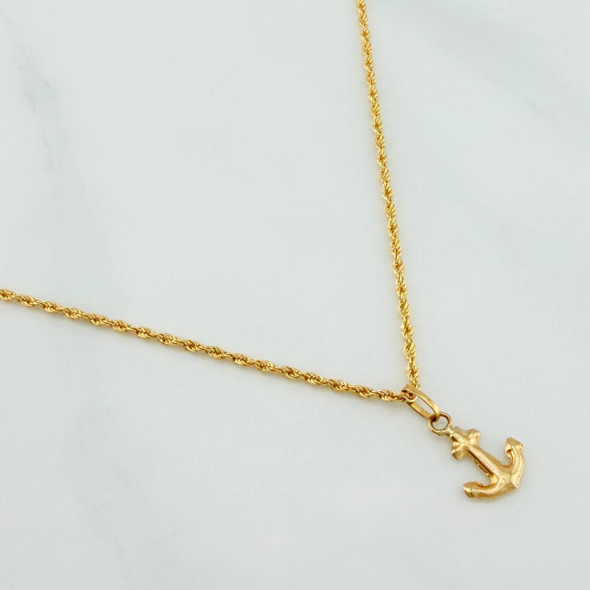 Set Cadena Lazo + Dije Ancla / 1.55gr / 50 cm Oro Amarillo 18K