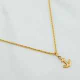 Set Cadena Lazo + Dije Ancla / 1.55gr / 50 cm Oro Amarillo 18K