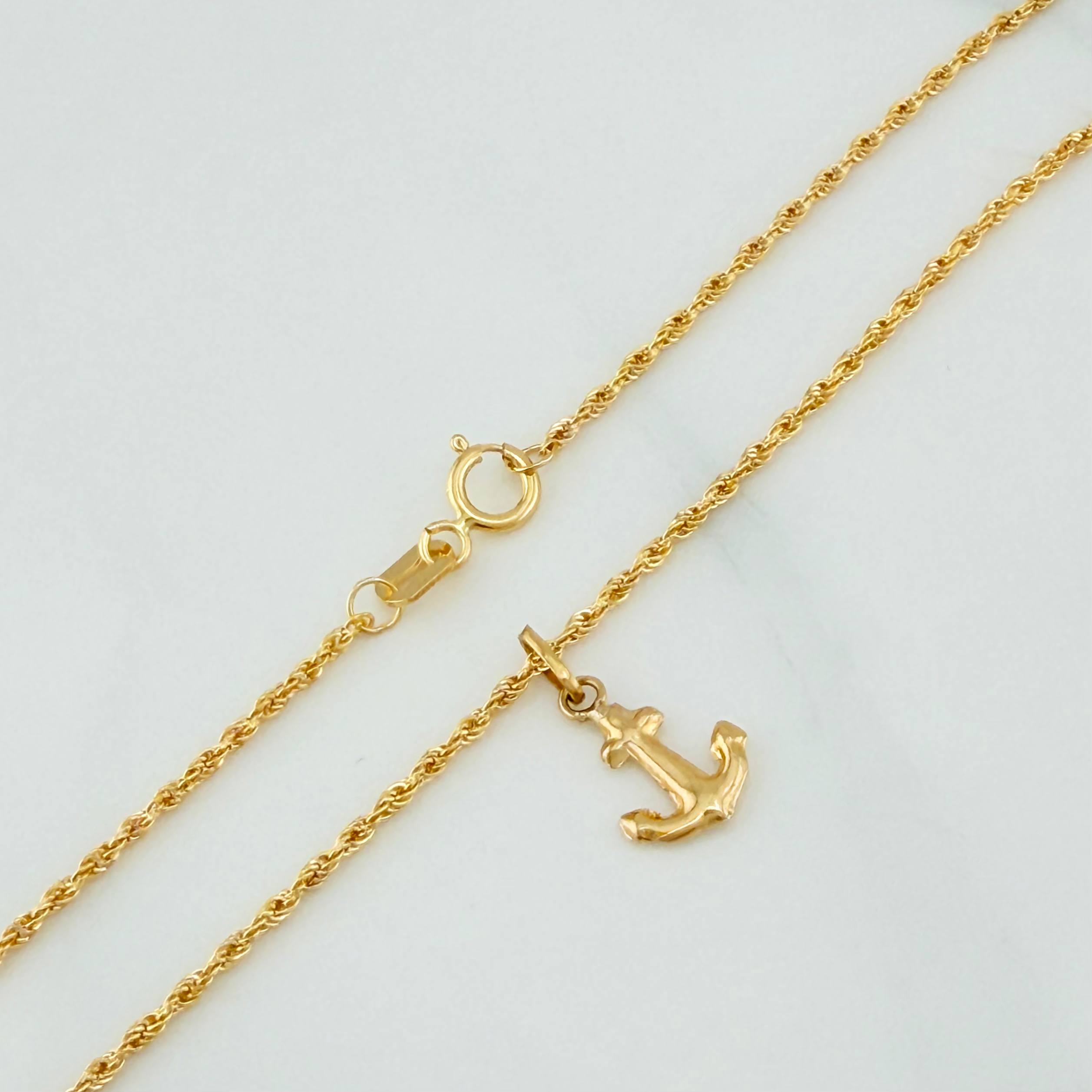 Set Cadena Lazo + Dije Ancla / 1.55gr / 50 cm Oro Amarillo 18K