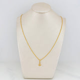 Set Cadena Lazo + Dije Ancla / 1.55gr / 50 cm Oro Amarillo 18K
