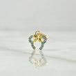 Dije Orejas De Ratón  0.35gr / 1.3cm / Circones Celestes  Oro Amarillo 18K ©