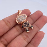 Dije Astronauta 8.75gr / 3.4cm / Circones Negros Blancos Oro Rosa 18K $