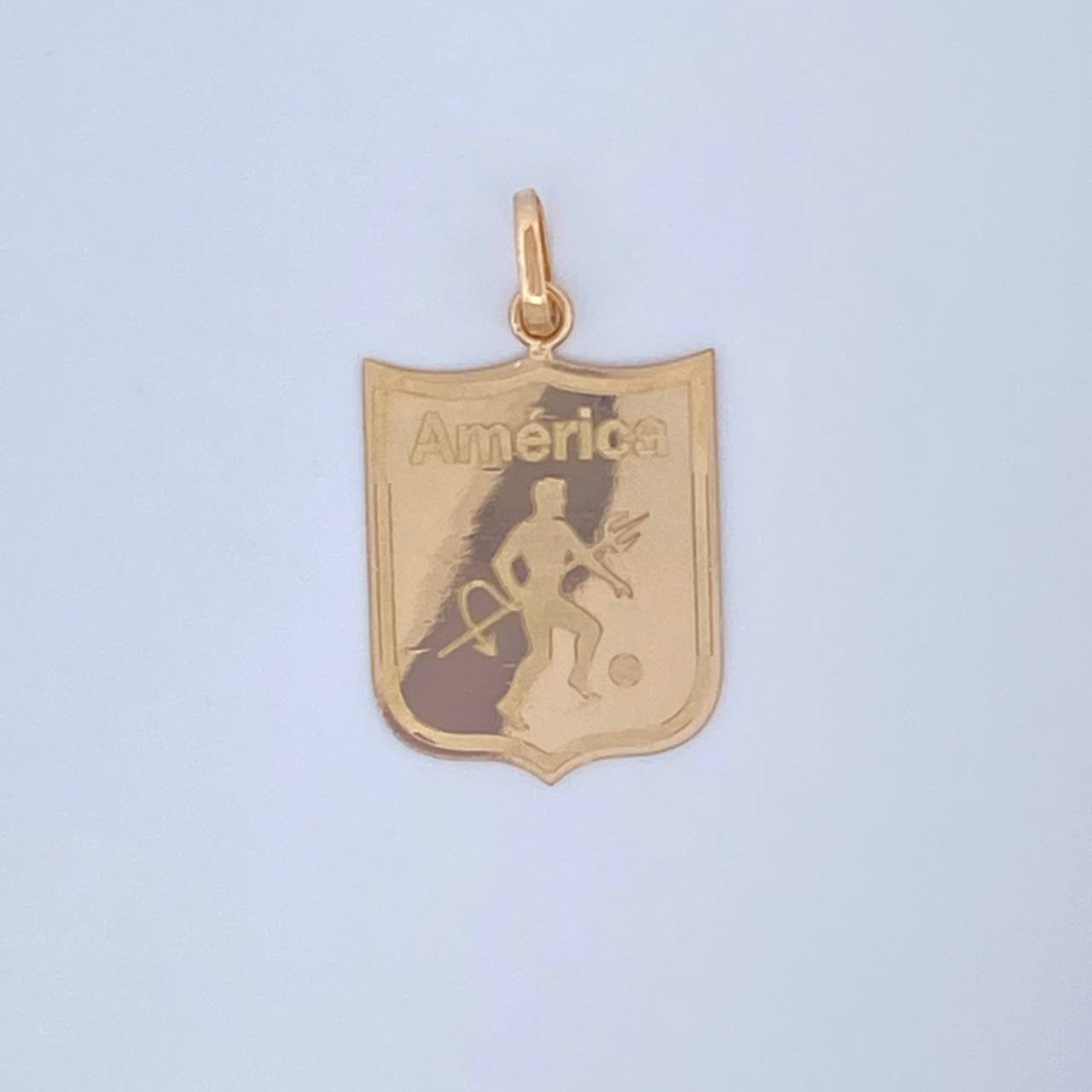 Dije America De Cali 1.6gr / 2.8cm / Oro 18K &