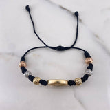 Pulsera Negra Herraje San benito 2.9gr / 6mm Bolas Diamantadas Tres Oros 18K &