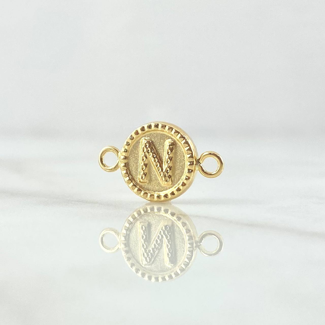 Herraje Letra N Mate 0.6gr / 1cm-1.7cm / Circulo Bordeado Oro Amarillo 18K ©