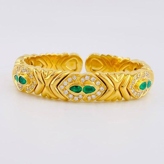 Pulso Aro Corazones Entrelazados Diamantes 2.17qts Esmeraldas 96pts 59.65g / 15cm / 11.8mm Oro Amarillo 18K