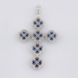 Dije Cruz Flor  Diamantes 1qts Zafiros 2.2qts 8.9g / 5.6cm Oro Blanco 18K
