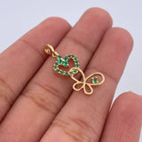 Dije Silueta Corazon Mariposa 1.35gr / 2.5cm / Esmeraldas 19 Pts Oro Amarillo 18K (Joya) &