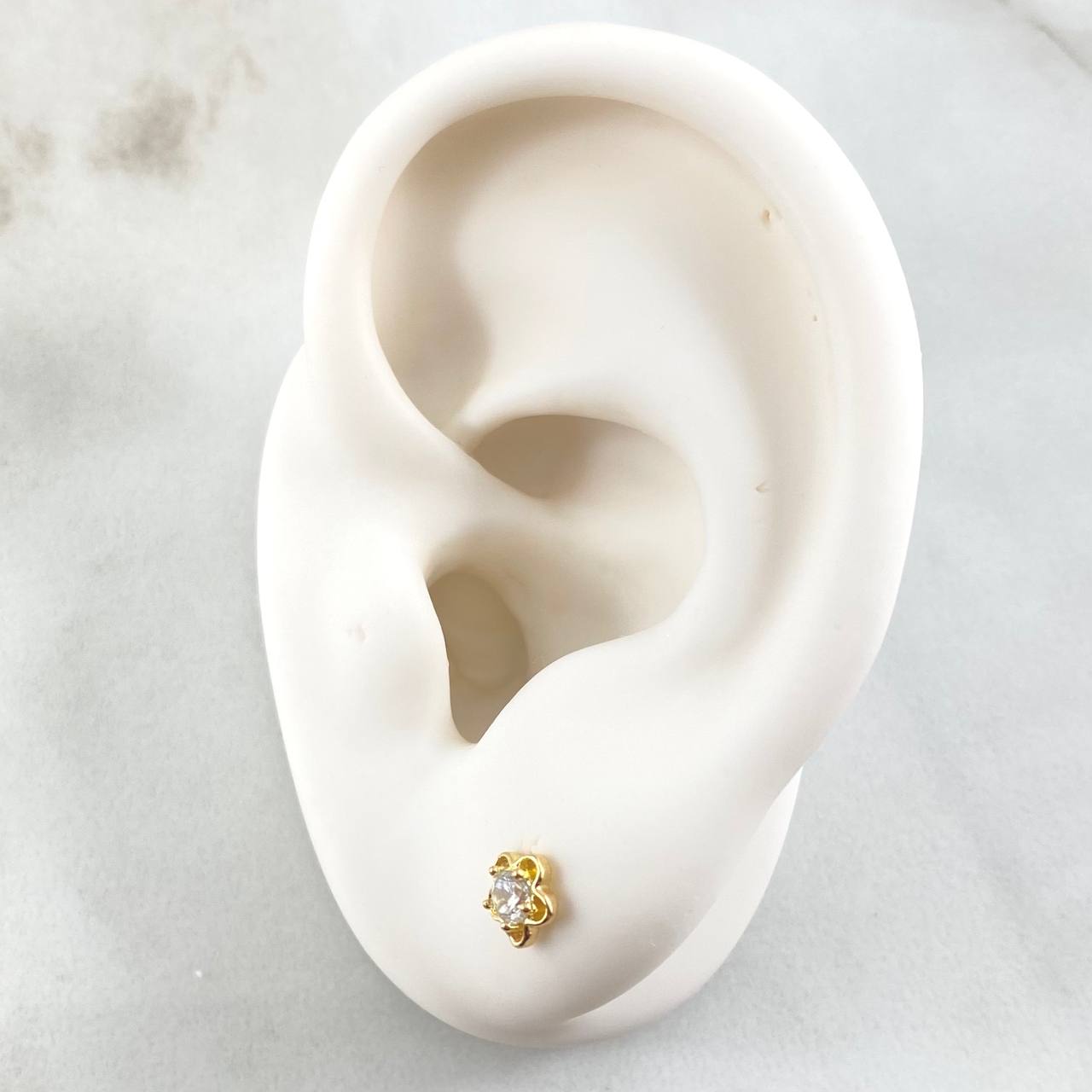 Topos Flor  0.9gr / Oro Amarillo 18K