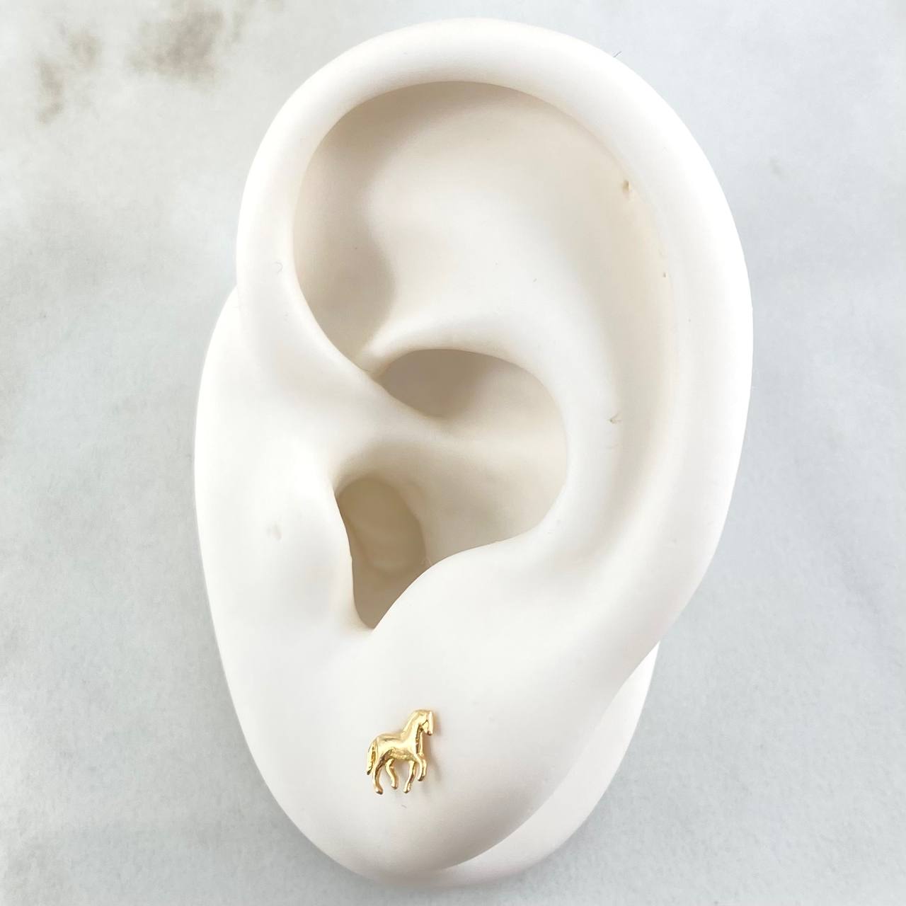 Topos Caballo 0.55gr / Oro Amarillo 18K ©