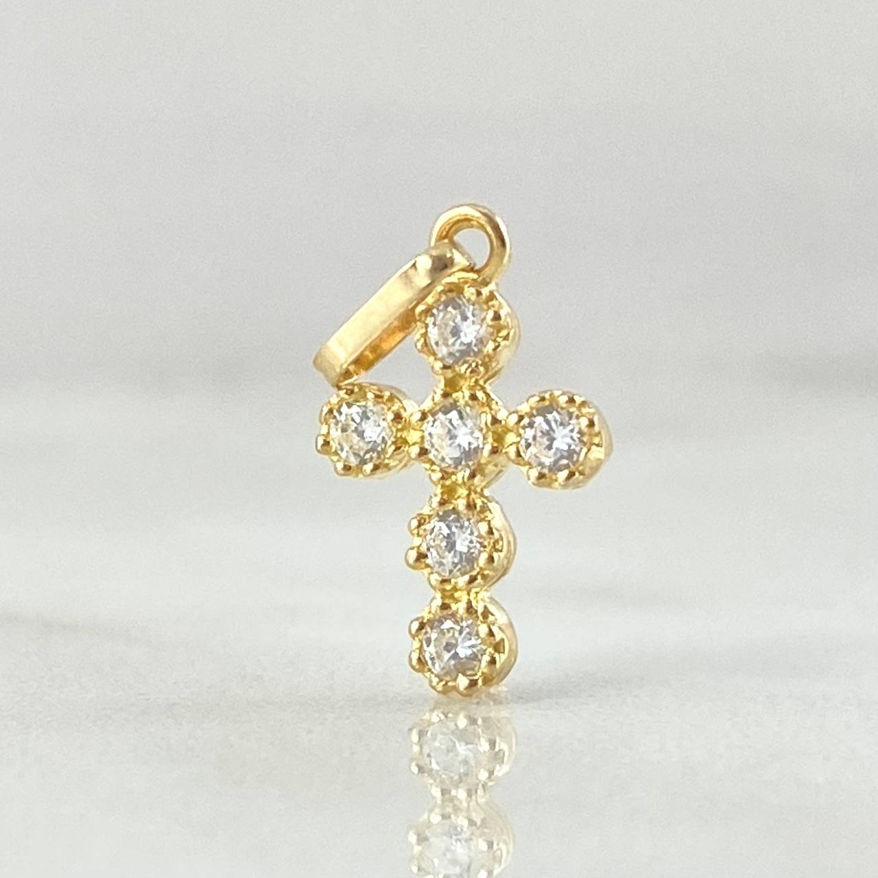 Dije Cruz 0.65gr / 1.8cm / Oro 18K ©