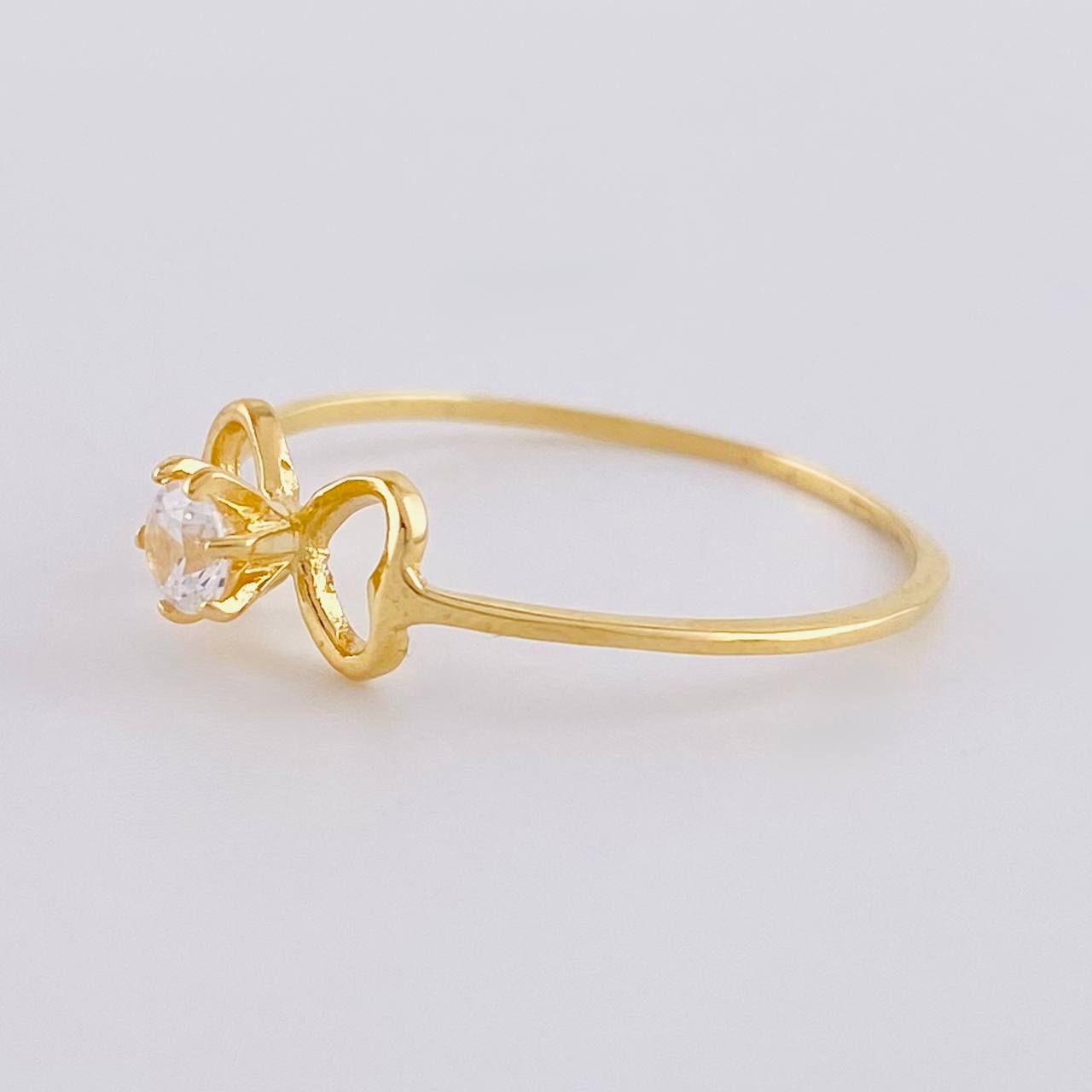 Anillo Moño Chispa 1.05 g / T8 1/4 Oro Amarillo 18K