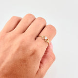 Anillo Moño Chispa 1.1 g / T7 Oro Amarillo 18K