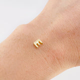 Herraje Letra E 0.3g / 0.6cm Oro Amarillo 18K