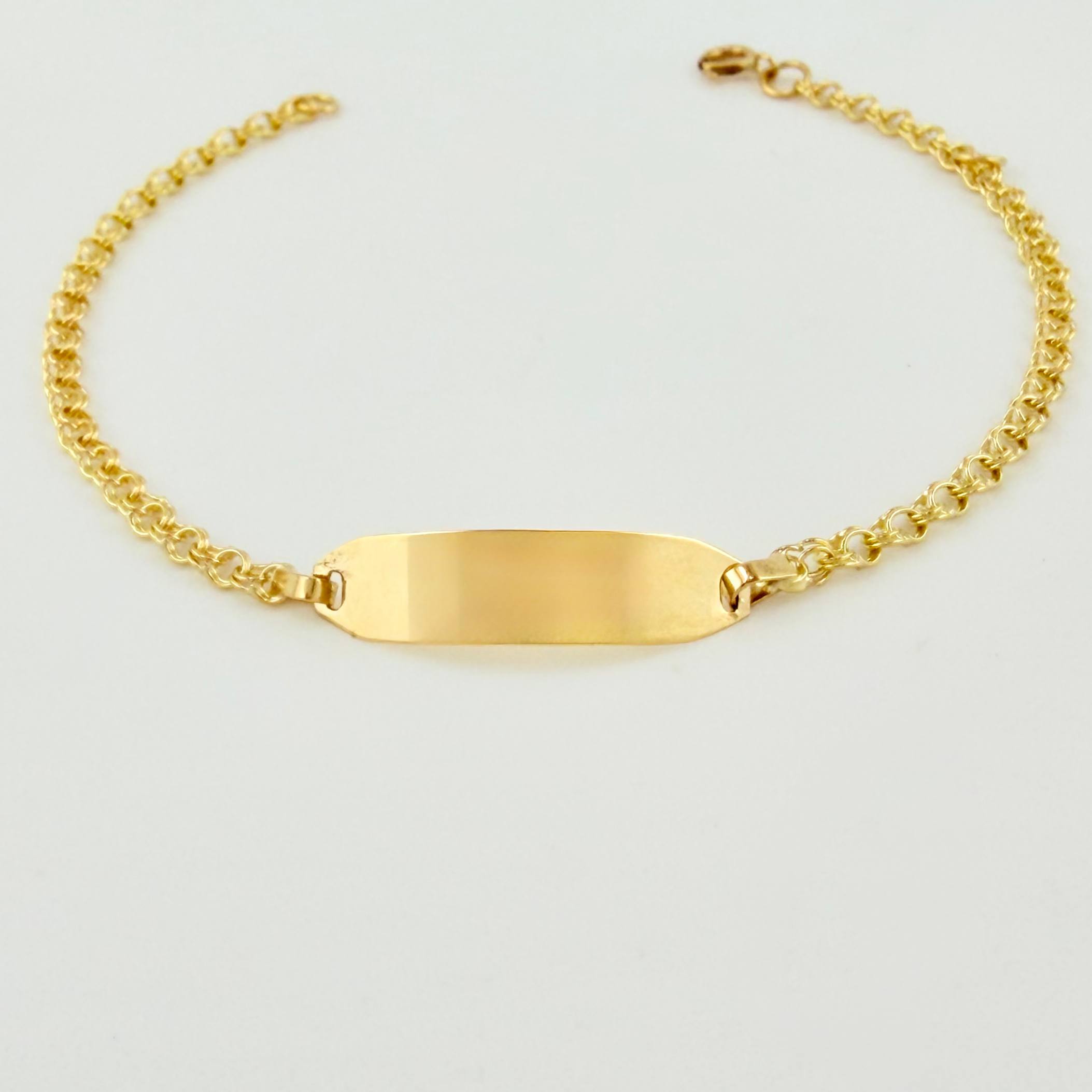 Pulso Bebé Roll On Placa Ovalada 1.35gr / 13.5cm / 2.3mm Oro Amarillo 18K ©