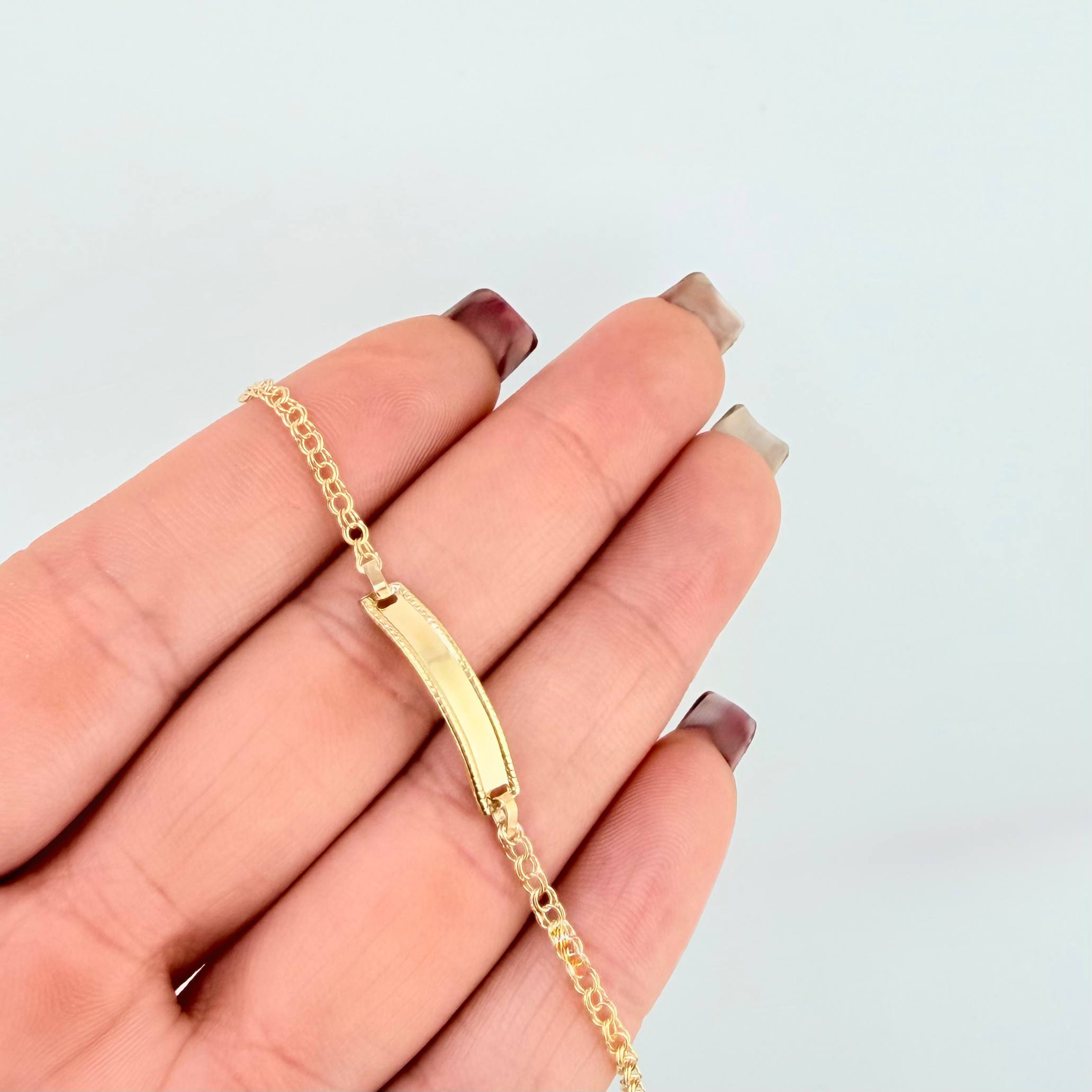 Pulso Bebé Roll ON Placa Rectangular Relieve 1.35gr / 14.5cm / 2.3mm Oro Amarillo 18K