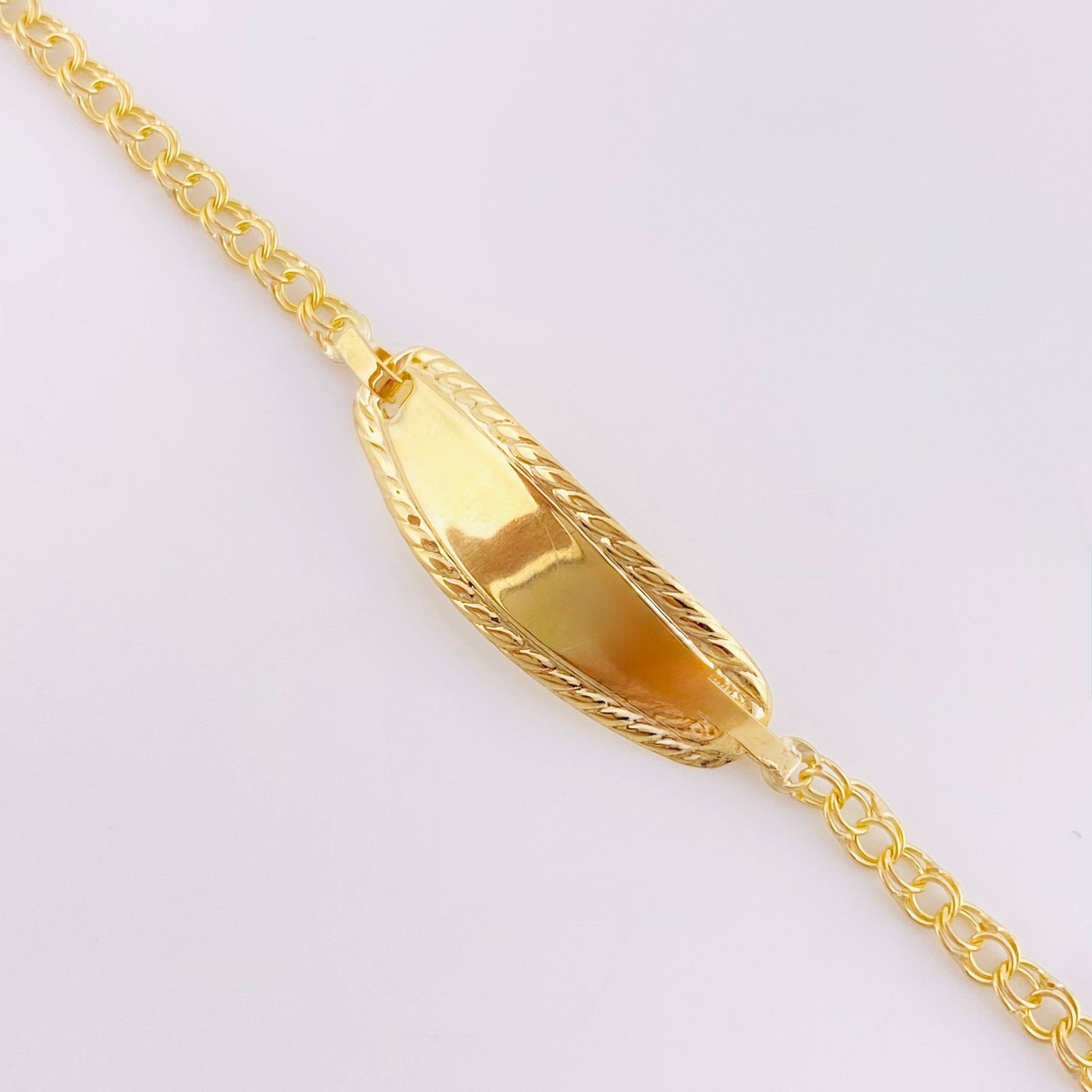 Pulso Bebé Roll On Placa Ovalada Rectancular Relieve 1.3gr / 14.5cm / 2.3mm Oro Amarillo 18K ©