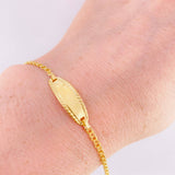Pulso Bebé Roll On Placa Ovalada Rectancular Relieve 1.3gr / 14.5cm / 2.3mm Oro Amarillo 18K ©