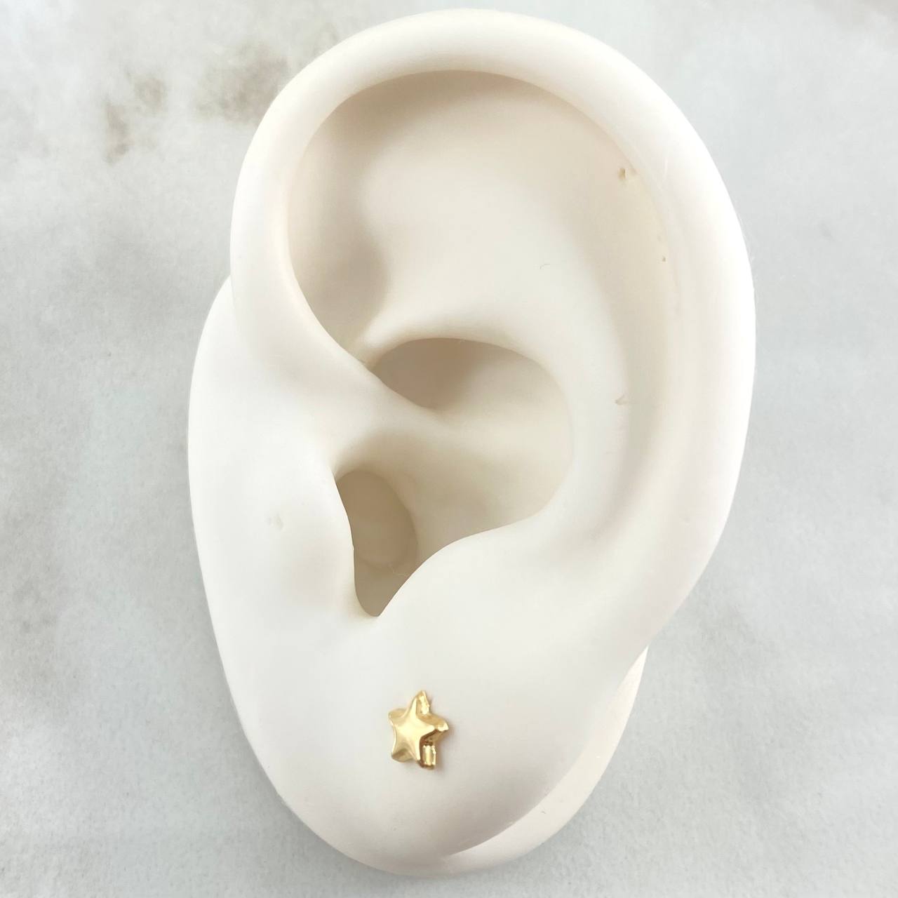 Topos Estrella 0.5gr / Oro Amarillo 18K ©
