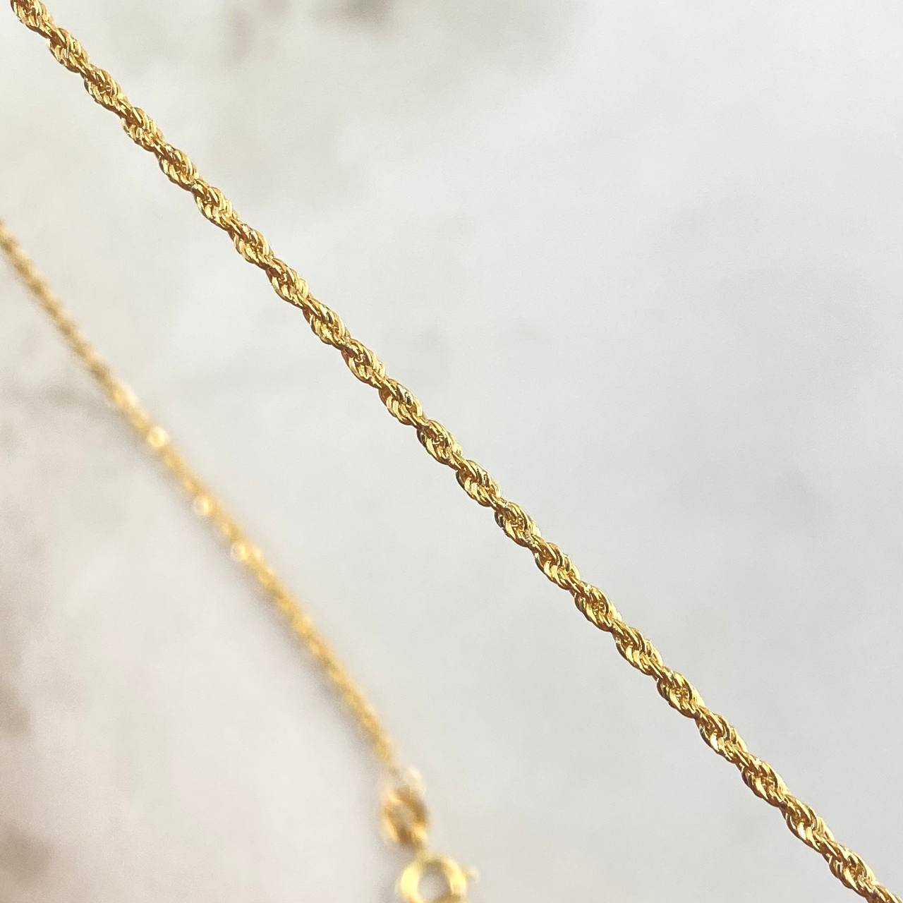 Set Cadena Lazo 1.4gr / 50cm / 1.5mm + Dije Corazón Corona 0.35gr / 1.4cm Circones Blancos 1.75gr Oro Amarillo 18K (Oferta)