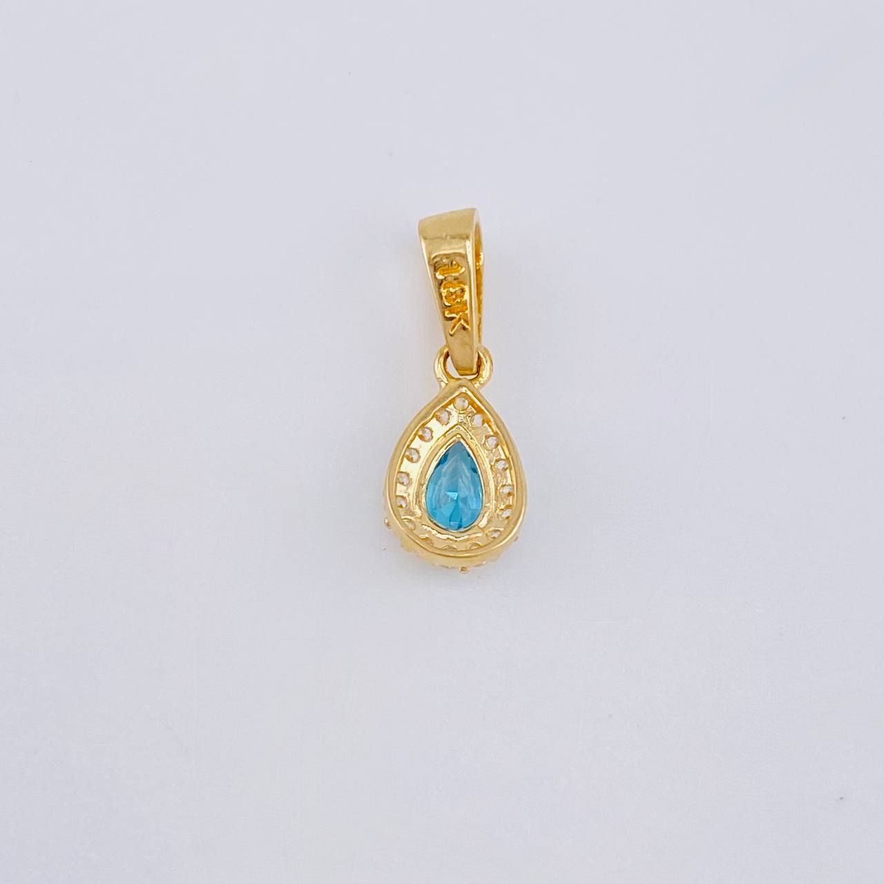 Dije Gota Tupida 0.7g / 1.5cm Oro Amarillo 18K