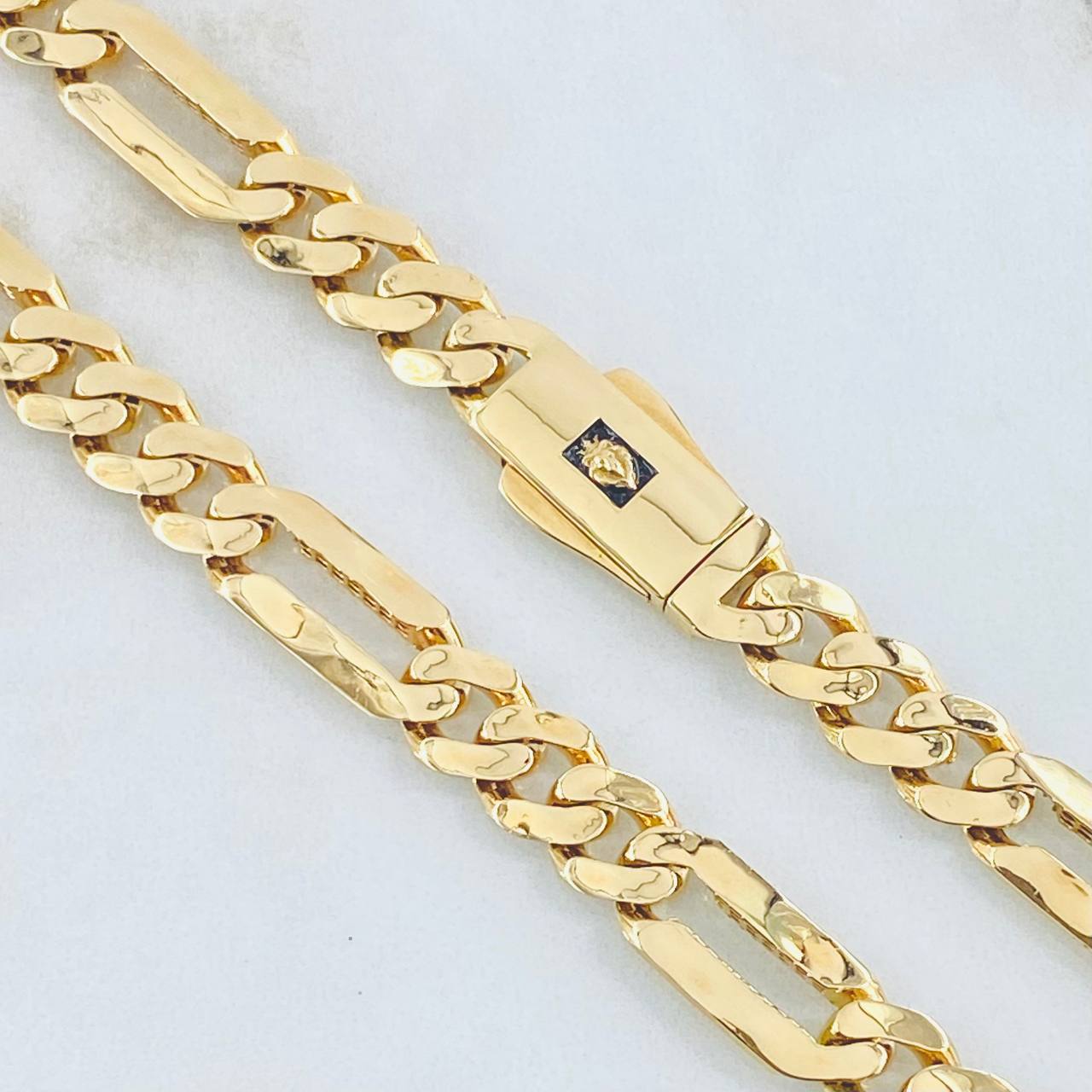 Cadena Figaro Tres Aros 32.05gr / 60cm / 8mm Oro Amarillo Nac.Esp. 18K ©