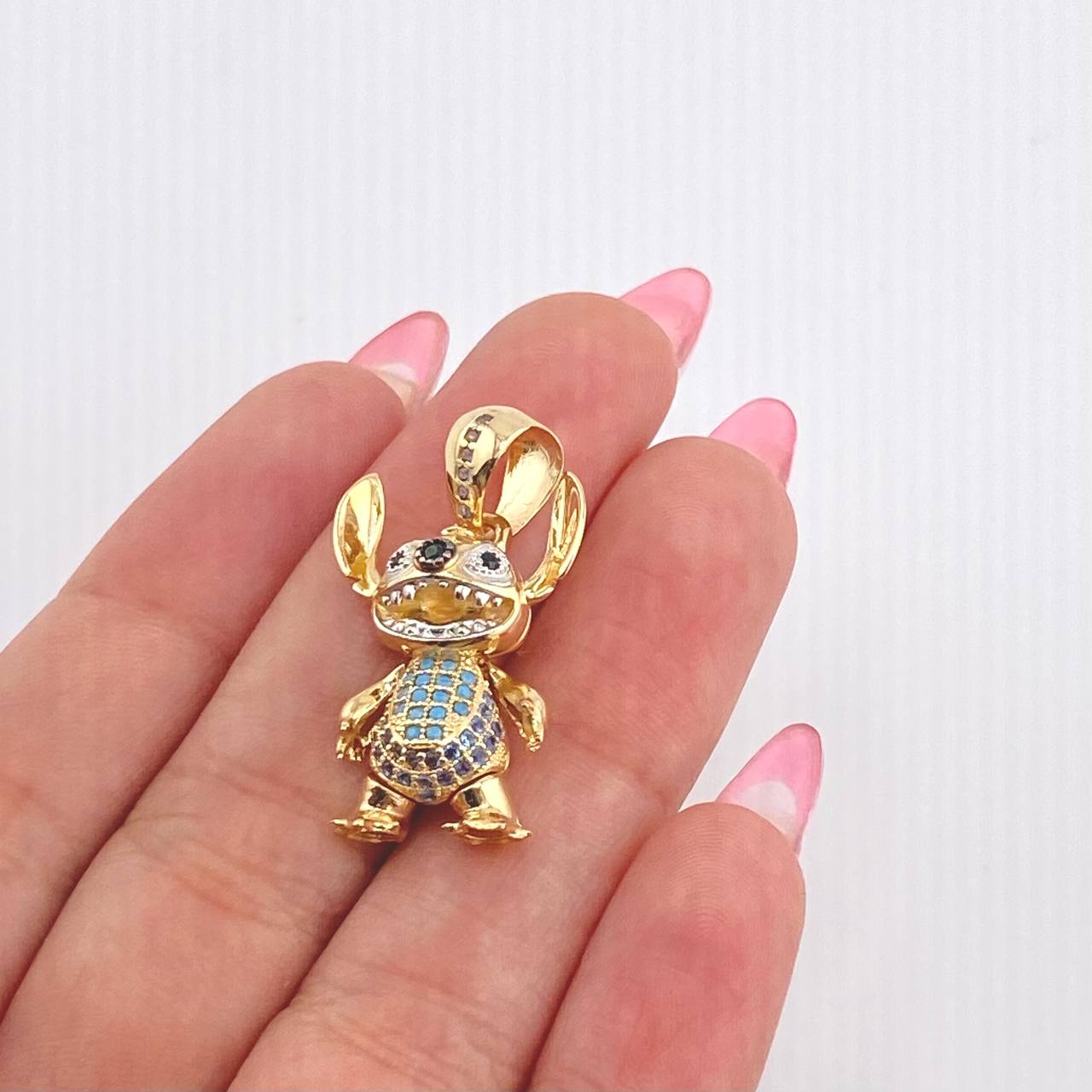 Dije Monstruo 626 5.4gr / 3cm / Dos Oros Amarillo Blanco 18K
