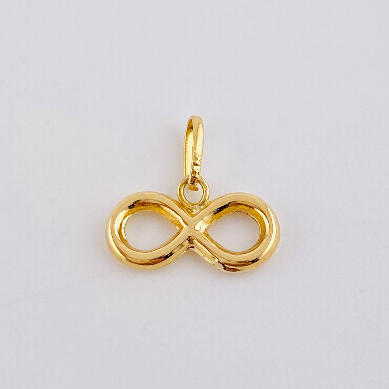 Dije Infinito 0.4gr / 1.1cm Troquelado Oro Amarillo