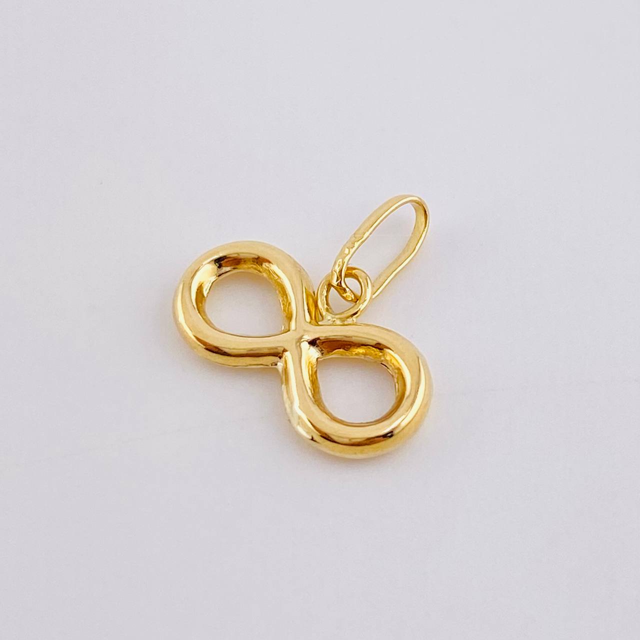 Dije Infinito 0.4gr / 1.1cm Troquelado Oro Amarillo