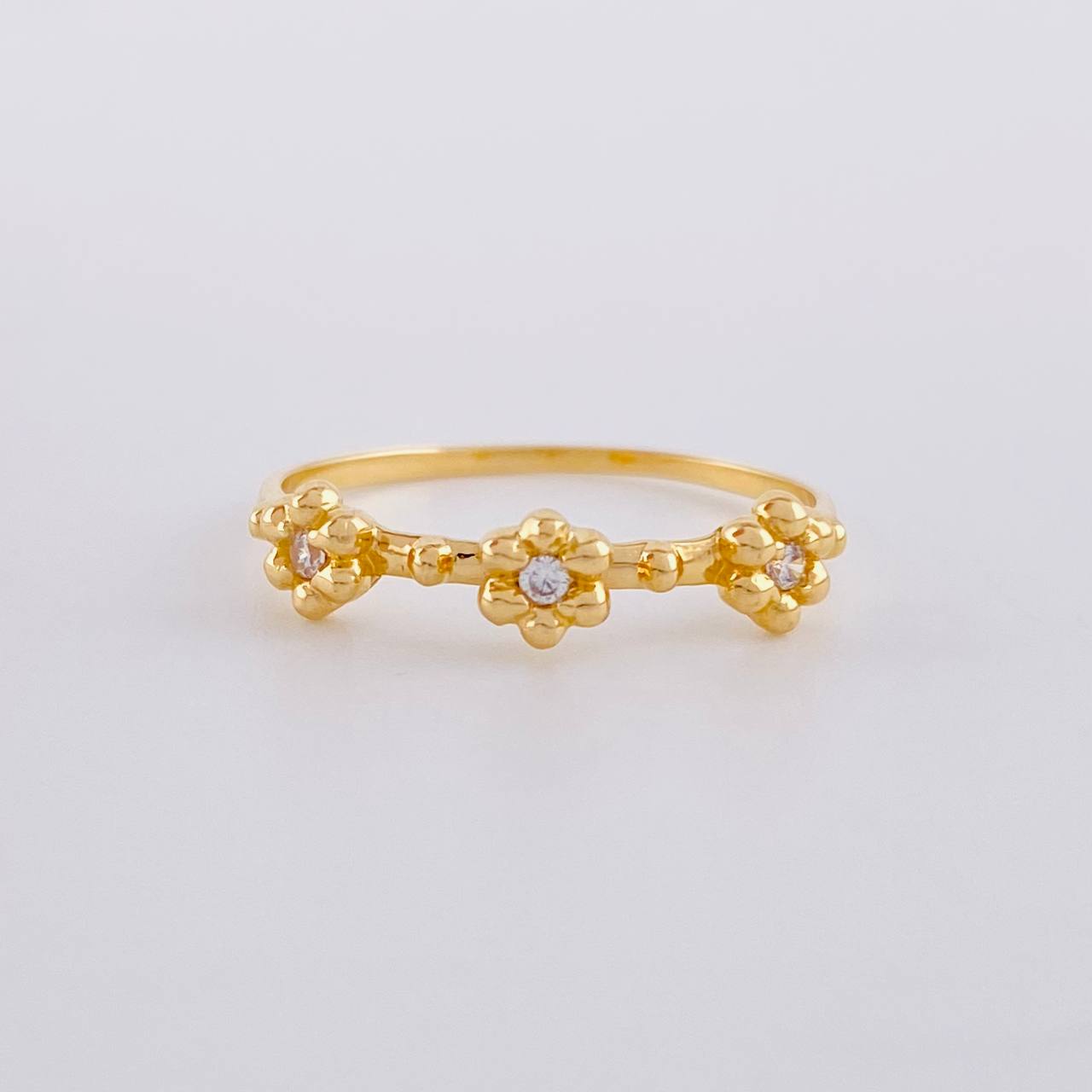 Anillo Trío Flores 1.6 g / T7 Oro Amarillo 18K